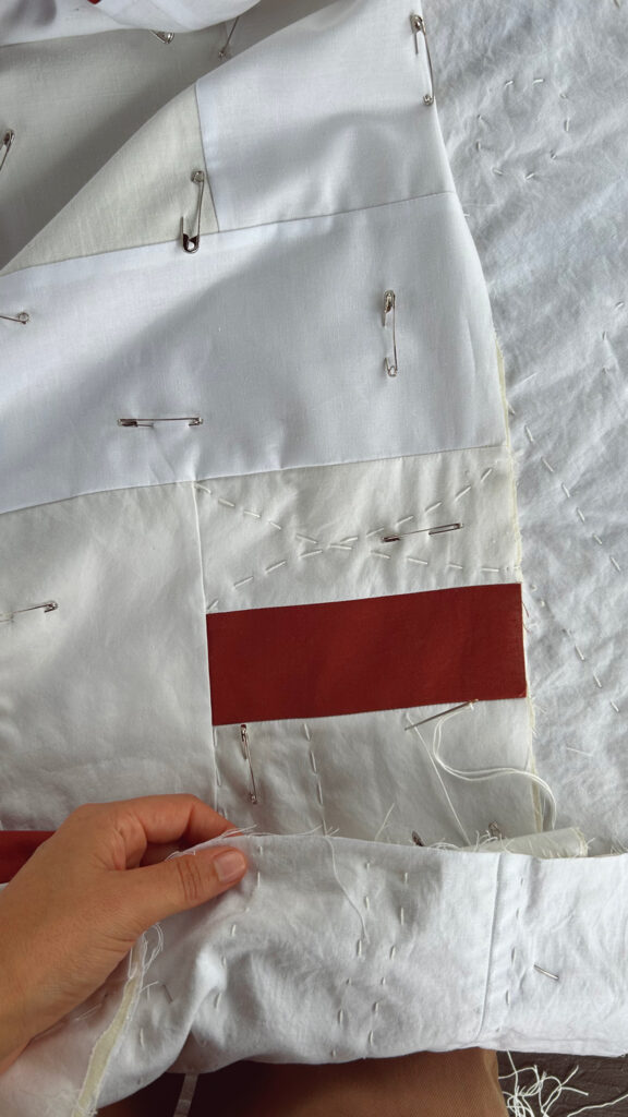 Hand quilting on quilt made by Ashlee Zlatna.